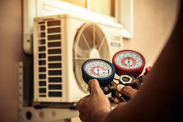 Professional Hvac technician working in Harris, MN
